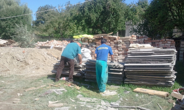 Asbestos being loaded for disposal