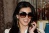 Kim Kardashian stă lângă poşta din Beverly Hills