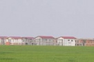 Ciudăţenie imobiliară: vile în mijlocul lanului de grâu