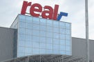 Real Romania reduce planurile de extindere pe 2009 din cauza problemelor de finantare ale dezvoltatorilor imobiliari
