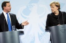 Cancelarul german şi premierul britanic nu cad de acord pentru salvarea Zonei euro