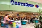 Reţeaua Carrefour va prelua 20 de noi magazine româneşti