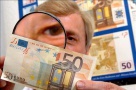 Atenţie, bani falşi! Sute de mii de bancnote false, lei şi euro, au fost confiscate în 2013