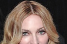 Madonna a cumpărat o casă la suprapreţ în New York
