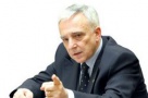 Isărescu: Criza trece cu investiţii